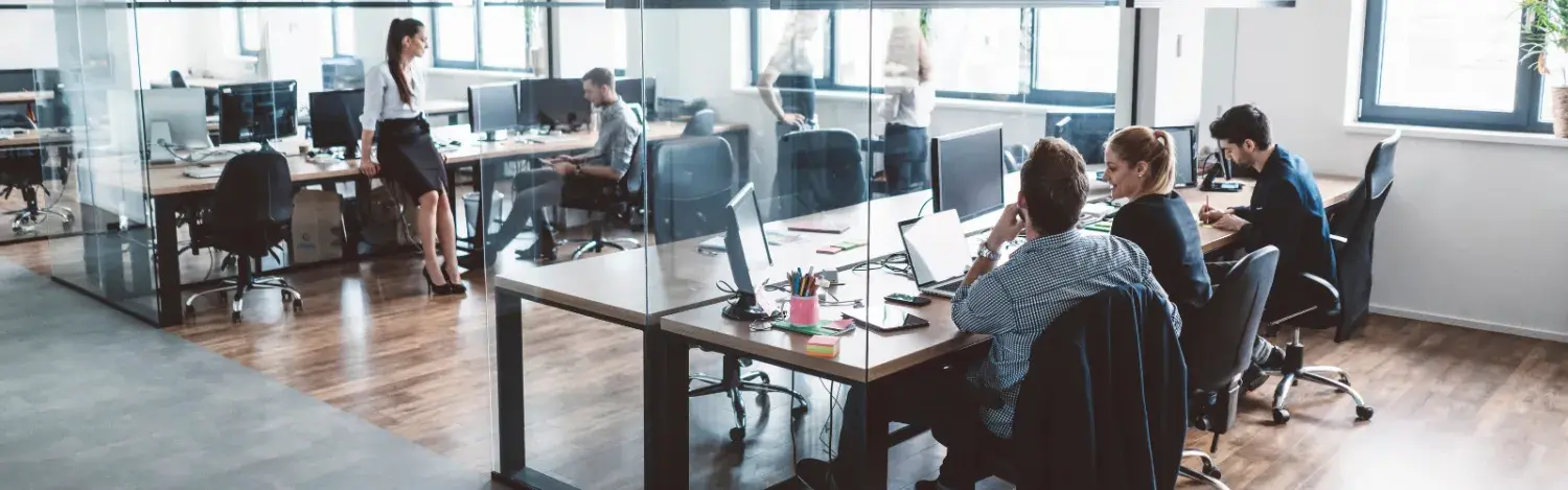 People getting together in an office workspace People getting together in an office workspace
