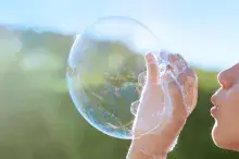 Child with soap bubble