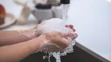 Washing hands with soap
