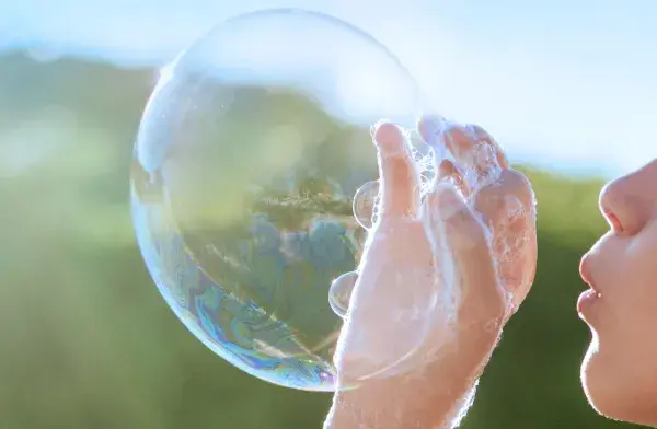 Child with soap bubble